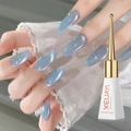 Glitter blue cat eye gel nail polish in white and gold bottle for UV LED manicure art - Ice Fairy Cat Eye