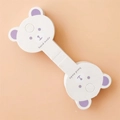 White and purple bear shaped child safety lock with handmade text on pink background - Cartoon Bear