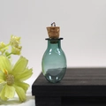 Mini teal teardrop glass wishing bottle with cork stopper and silver metal ring loop - Dark Green Oval Bottle With Eye Screw Cork