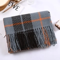 Detail of grey plaid cashmere scarf showing soft fringe and textured yarn fabric - Coffee and Blue Plaid
