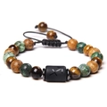 Adjustable tiger eye and turquoise beaded bracelet featuring black Sagittarius charm - Sagittarius-Braided Cord