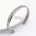 Detail of 8mm wide vintage titanium steel cuff with 62mm diameter and woven texture - 8mm Wheat Ear Texture (Style 8)