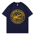 Navy blue cotton T-shirt featuring a bold yellow circular alligator print and crew neck - S / Navy Blue