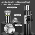 Black 1000ml vacuum insulated bottle in 316 stainless steel with tea infuser and steel lid - 1000ml / Long Tea Filter + Carrying Rope / Classic Black
