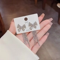 Elegant silver bow tassel earrings with sparkling rhinestones and S925 silver needles - Bowknot Rhinestone Tassel (AC-7521) / Silver