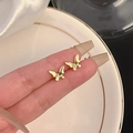 Elegant gold butterfly stud earrings for women featuring a realistic metal finish design - Vivid Gold Butterfly