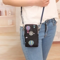 Black mini crossbody phone bag featuring hot air balloon patterns and blue strap - Black Balloon Pattern