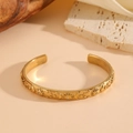 Vintage gold celestial cuff bracelet featuring sun moon and star motifs with rhinestones - Sun Moon Star Embossed White Zirconia Style / Gold (White Zirconia)
