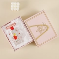 Pink gift set with a strawberry patterned glass cup, silicone lid, and glass straw - Strawberry / Gift Box
