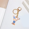 Golden letter Y keychain with vintage blue and orange tile pattern on white surface - Letter Y (No Tassel)