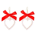 Close-up of red ribbon bow earrings with heart-shaped faux pearl drop charms - Red (Gold Hook)