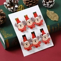 Détail de 6 pinces de Noël en bois avec rennes pour décoration et emballage cadeau - Cerf / Lot de 6