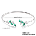 Detail view of silver willow leaf bracelet with green gems and 6.5cm inner diameter - Silver with Green Rhinestone
