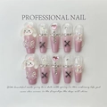 Primer plano de dijes 3D Cinnamoroll, corazones rosas y lazos en uñas postizas artesanales - Extra Pequeño (XS) / Perro de Dibujos Animados Rosa Largo