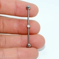 G23 titanium industrial barbell earring with a single white opal center and silver balls - White Opal (OP17)