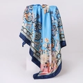 Detail of silk-like blue square scarf with bohemian paisley print on white pedestal - 90x90cm / Blue (D9128)