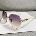 Lunettes de soleil géométriques sans monture avec verres dégradés violets et branches dorées - Monture Or Verres Violet Thé