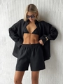 Detail of black linen three-piece set showing fabric texture and elastic waistband shorts - Black
