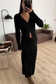 Detalle de conjunto de punto acanalado negro con cárdigan de cuello en V y falda larga - S / Negro