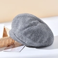 Classic grey tweed beret with fabric texture, displayed in a stylish, minimalist setting - One Size / Gray