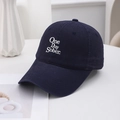 Close-up of One Day Sober white embroidery on dark blue cotton vintage baseball cap - Navy Blue