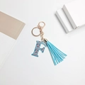 Letter F keychain with paisley pattern and light blue tassel in rose gold finish - Letter F (With Tassel)