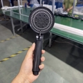 Matte black handheld shower head with multi-function spray settings and round design - Glossy Black 5-Mode Spray Shower Head