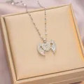 Elegant silver titanium heart and angel wings pendant necklace with cubic zirconia - 6033 Wings Heart / Silver