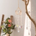 Golden Tree of Life crystal suncatcher with prismatic beads hanging on a branch - Fairy Pyramid Suncatcher