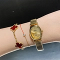 Elegant gold oval quartz watch for women with metallic stretch band and clover bracelet - Metal Elastic Strap / Full Gold Color