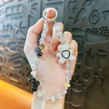 Handmade cute rhinestone bear phone strap charm with iridescent beads and crystal heart - White
