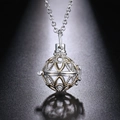 Collier diffuseur d'huiles avec plume et pendentif boule creuse bicolore argent et or - Médaillon Sphérique Bicolore Argent Or (33)