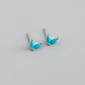 Detailed view of sterling silver leaf-shaped earrings with marquise turquoise stones - Style E (Silver)