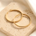 Chic gold hoop earrings with textured pyramid pattern in minimalist stainless steel - Diamond Pattern Textured Hoop Style (E125)