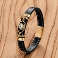 Punk leather bracelet with golden Fatima Hand and Evil Eye on a wood background - Style C (Hamsa Hand) / 21cm