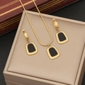 Golden geometric stainless steel jewelry set with black shell inlay on a gift box - Necklace and Earring Set / Black