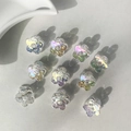 Set of ten aurora-colored iridescent resin flower charms for DIY jewelry and nail art - Hollow Plum