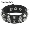 Detailed macro view of eco-friendly leather strap with silver skull and cone studs - Black Skull (Eco-leather)