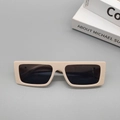 Flat lay of cream rectangle sunglasses with dark lenses on a minimalist grey background - Off White