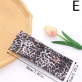 Detailed flat lay of leopard print elastic headband with measurements of 20cm by 7cm - Style E