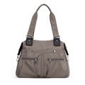 Large taupe nylon tote bag with multi-zipper pockets and black shoulder straps - Brown