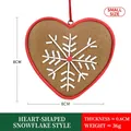 Small heart-shaped gingerbread ornament with white snowflake and red hanging string - Heart-Shaped Snowflake Gingerbread Ornament