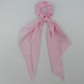 Elegant pale pink satin scrunchie with long ribbon tails for ponytail styling - Lotus Pink