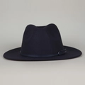 Detail of wool felt fedora hat featuring a navy leather band and metallic buckle - Black