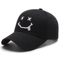 Black cotton baseball cap featuring a white bad smiley face embroidery in a trendy style - Adjustable / Black