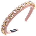 Close-up of pink padded headband with hand-sewn crystals and handmade label detail - Pink