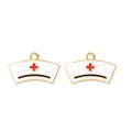 Mini nurse hat charms with white enamel and red cross detail in golden finish - Nurse Hat