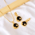 Ensemble collier et boucles d'oreilles dorés avec pendentifs noirs à motifs lune et fleurs - Ensemble Zirconium Noir