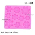 Molde de silicona rosa con nueve patrones de copos de nieve para pasteles o arcilla - Rosa