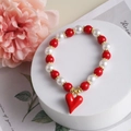 Handmade beaded bracelet with red and white pearls, golden spacers and a red heart charm - Style E-Red Heart Pendant